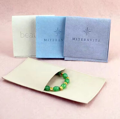 custom embossed suede microfiber jewelry pouch with insert card pads custom logo
